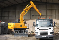 Skip Hire Harlow unloading a lorry